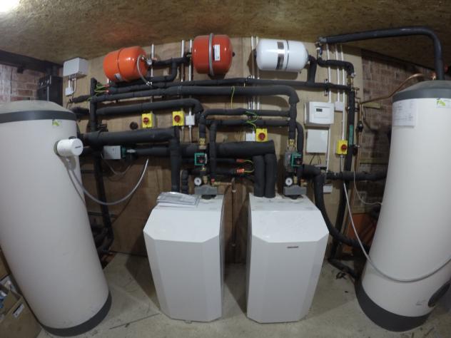 Completed plant room with WPF set with a buffer tank for space heating and a hot water tank for showers and baths.